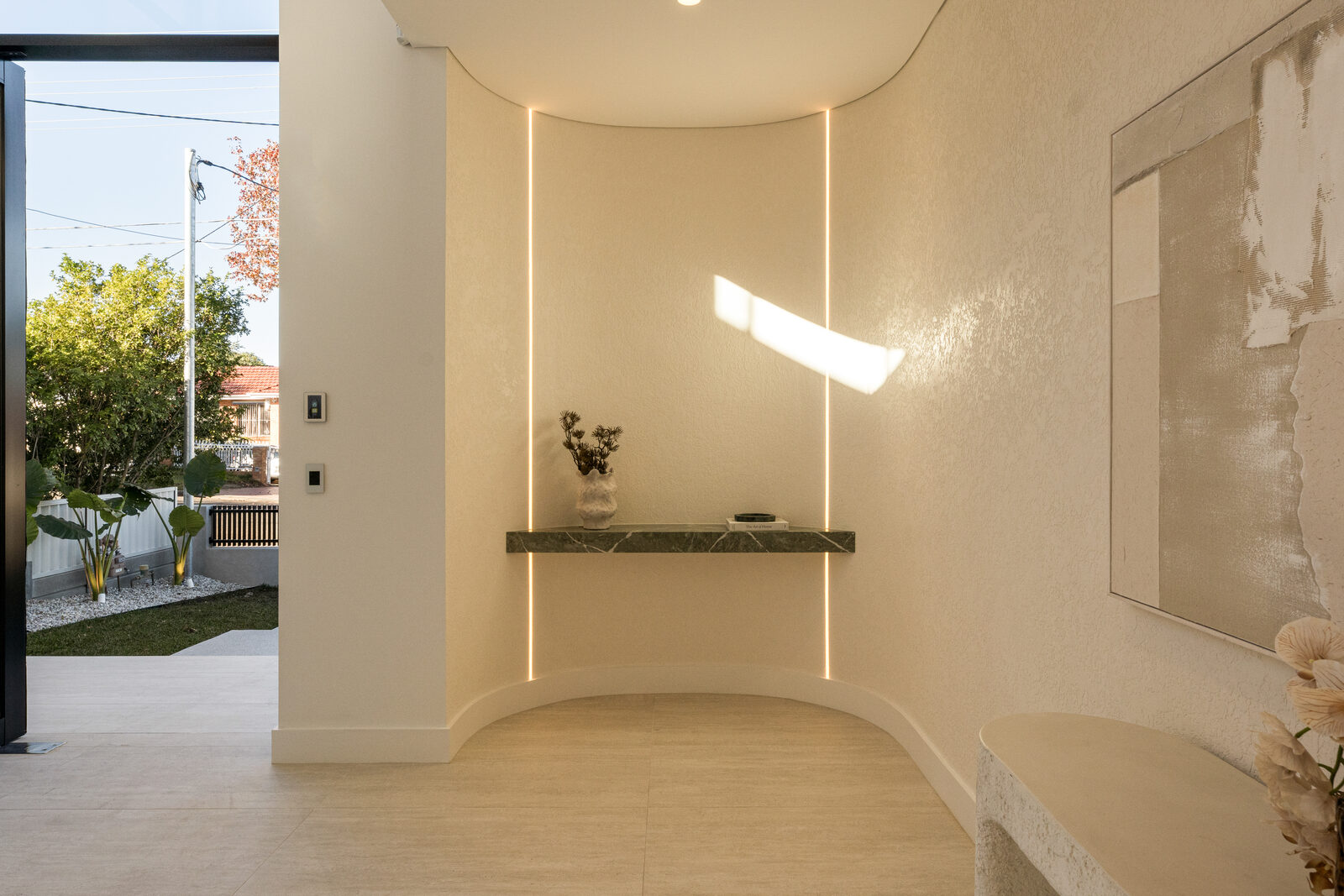 The Grace Residence — curved entry nook
