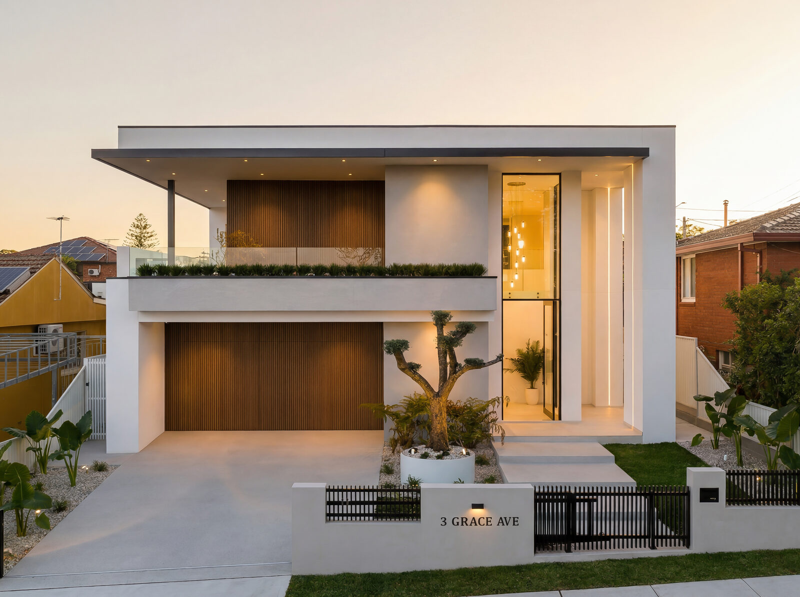 The Grace Residence — facade at dusk