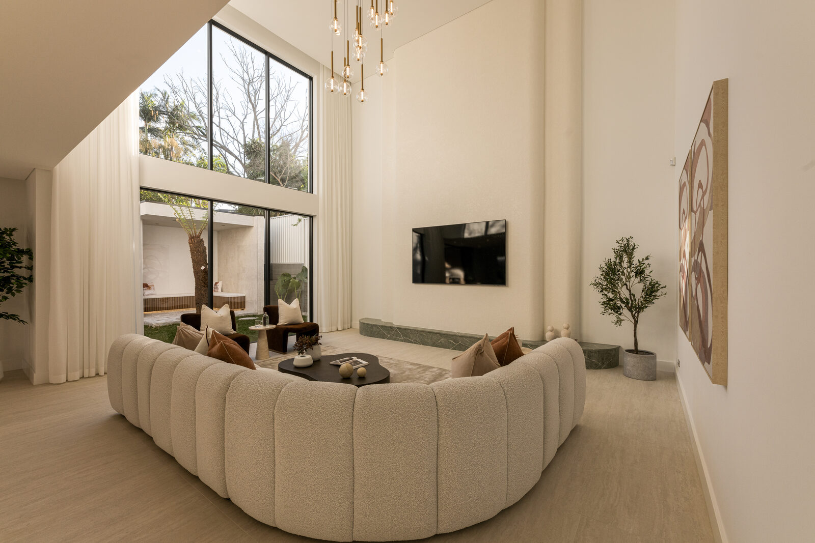 The Grace Residence — double-height living